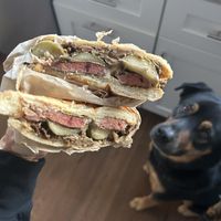 Cubano - pulled lions mane mushroom, house pickles, lentil häm, swiss chëëse & mustard.   at The Plot Express in Carlsbad