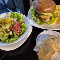 Mixed salad, vegan Burger and vegetable Empanada at Restaurante Lucky in San Cristobal