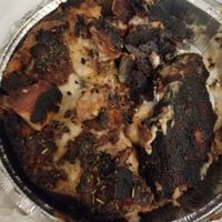 Burnt underside of a slice at Hot For Pizza in Richmond