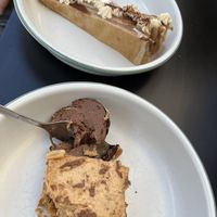 Crepe cake with pear and chocolate (top) and gourmandise with peanut and caramel (bottom)  at Café Pfusch in Leipzig
