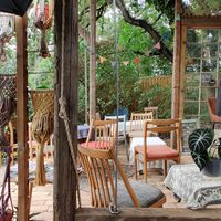 Seating options at Constans Random Cafe in Balatonalmadi