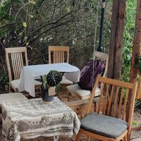 Seating options at Constans Random Cafe in Balatonalmadi