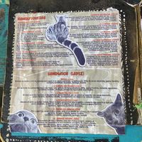 Menu with vegan burger and vegan sandwich  at Monchadeho in Cartago