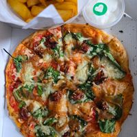 Popeye pizza, veganised, with chips. Delicious. at Dough. in Troon