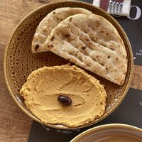 Hummus & pita  at Amigos Malaga Centro in Malaga