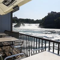 Outdoor seating at Schlössli Wörth in Neuhausen Am Rheinfall