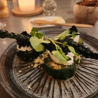 Miso Cucumber with kale chips, seaweed "caviar" and vegan cheese at Camp Ripan in Kiruna