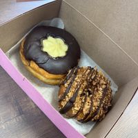 Boston cream and coconut donuts  at Just Fine Donuts in Alexandria