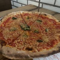 Their vegan pizza, $20 as of August 2025  at Pizzeria La Rosa in New Rochelle