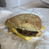 Breakfast sandwich made with cheddar and herb scone  at Petunia's Pies and Pastries in Portland