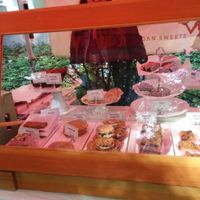 Petunias farmers market case, delicious baked goods! at Petunia's Pies and Pastries in Portland