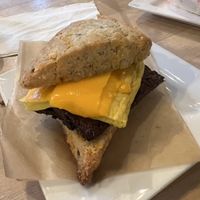 Cheddar and bacon breakfast sandwich   at Petunia's Pies and Pastries in Portland