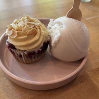 a cupcake and a scoop of ice cream  at Petunia's Pies and Pastries in Portland