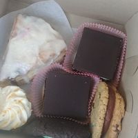 Mint brownies, bluberry lemon scone, babycake, and cookie sandwhiches at Petunia's Pies and Pastries in Portland