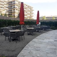 Outdoor seating (when closed) at grepery in Duebendorf