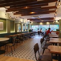 Upstairs seating (front) at The Veg Box Cafe - London in North West London