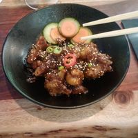 Mongolian cauliflower bites, good portion (chopsticks close to camera!) at The Veg Box Cafe - London in North West London