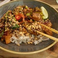 Teriyaki noodles with tofu, good portion (chopsticks close to camera). at The Veg Box Cafe - London in North West London