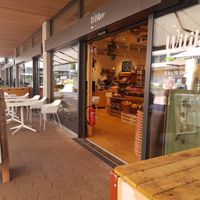 Exterior and seating at Witiker Bioladen in Zurich