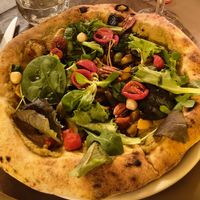 Pizza vegana 12€. Really tasty 😋 at Re al Quadrato in Montepulciano