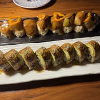 Dragon roll in the front; roll with eggplant in the back (don’t recall name but it was amazing!)  at Shojin - Culver City in Culver City