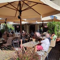Outdoor seating at Café Bruderholz in Basel