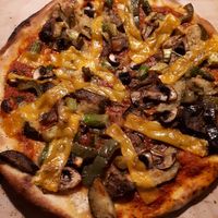 Vegan Pizza with peppers, aubergine, champions, asparagus and vegan cheese at Restaurant Worpsweder Bahnhof in Worpswede