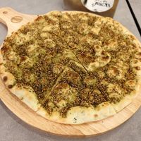 Vegan Green Zaatar Manaeesh at Operation Falafel  in Abu Dhabi