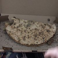 Oat dough manakish   at Operation Falafel  in Abu Dhabi