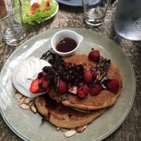 Pancakes with whipped coconut cream  at East St Cafe and Bar in Nelson