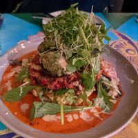Stuffed mushrooms over a veggie fritter and mashed vegetable based  at East St Cafe and Bar in Nelson