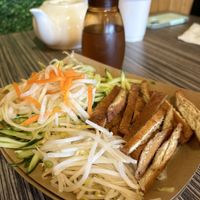  Rice rolls (hidden under salad)  at Nam Vegan Express in Burnaby