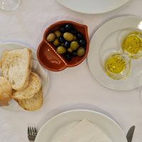 You get fresh bread, olives and olive oil to start as soon as you sit. at O Pelourinho in Alijo