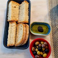 Fresh bread, olives and loval olive oil. at Flor De Sal in Mirandela