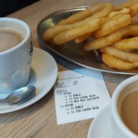 Café con leche de soja y tejeringos at Tejeringo's Coffee in Malaga