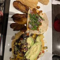 Sampler plate with yuca fries and plantains   at La Rumba Restaurant Latino in Asheville