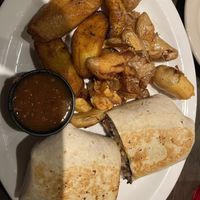 Burrito with smashed potatoes and plantains   at La Rumba Restaurant Latino in Asheville