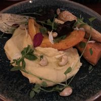 Vegan polenta with pumpkin, carrots, fennel, and cashews at Brussels Lof in Groningen