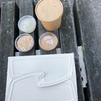 different sauces + soup   at Abu Amr Koshari  in Amsterdam