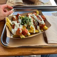 Vegan currywurst with garlic fries  at Frittenwerk - Alexanderplatz in Berlin