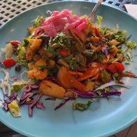 Vegan Tostada with cauliflower, zucchini, cabbage, lettuce, rice and beans. at Corazon Cafe  in San Luis Obispo