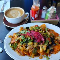 Vegan Chilaquilies, oat latte at Corazon Cafe  in San Luis Obispo