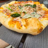Vegan broccolini pizza with red pepper flakes at BrewDog in Canal Winchester