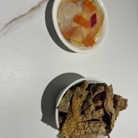 Crispy seaweed crisps and pickled papaya   at Whole Earth 环界蔬食 in Central Singapore