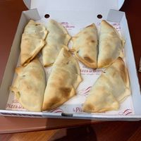 These are the vegan empanadas. They are great for walking around the city or late night snacks! at La Pizza del Born  in Barcelona