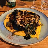 Baked eggplant with carrot hummus. Bad picture because it was dark, but the dish was the best I had in Croatia.  at Hvar Brewing Co in Hvar