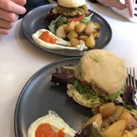 Burgers and patatas bravas  at Mango & Caoba in Barcelona