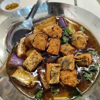 Brinjal, fish and basil leaves 😋 at Home Vege Restaurant in Masai