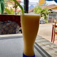 Pine, mango and orange smoothie   at Veggie's in Vang Vieng