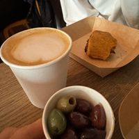 olives and cafe latte  at Wilhelmina in Leamington Spa